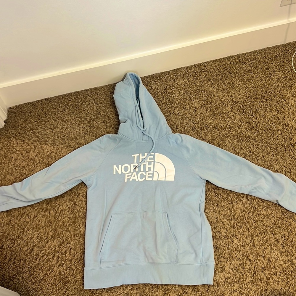 The North Face light blue hoodie.
